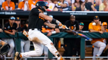 Jun 24, 2024; Omaha, NE, USA; Tennessee Volunteers left fielder Dylan Dreiling (8) hits a two-run home run against the Texas A&M Aggies during the seventh inning at Charles Schwab Field Omaha. Mandatory Credit: Dylan Widger-USA TODAY Sports