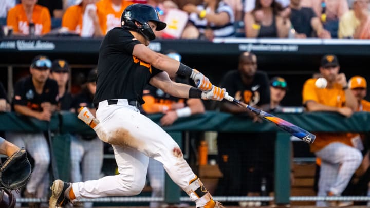 Jun 24, 2024; Omaha, NE, USA; Tennessee Volunteers left fielder Dylan Dreiling (8) hits a two-run home run against the Texas A&M Aggies during the seventh inning at Charles Schwab Field Omaha. Mandatory Credit: Dylan Widger-USA TODAY Sports