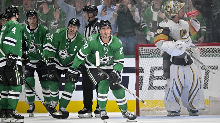 Apr 22, 2024; Dallas, Texas, USA; Dallas Stars defenseman Miro Heiskanen (4) and defenseman Thomas Harley (55) and center Tyler Seguin (91) and left wing Mason Marchment (27) skate off the ice after Marchment scores a goal against Vegas Golden Knights goaltender Logan Thompson (36) during the third period in game one of the first round of the 2024 Stanley Cup Playoffs at the American Airlines Center. Mandatory Credit: Jerome Miron-USA TODAY Sports