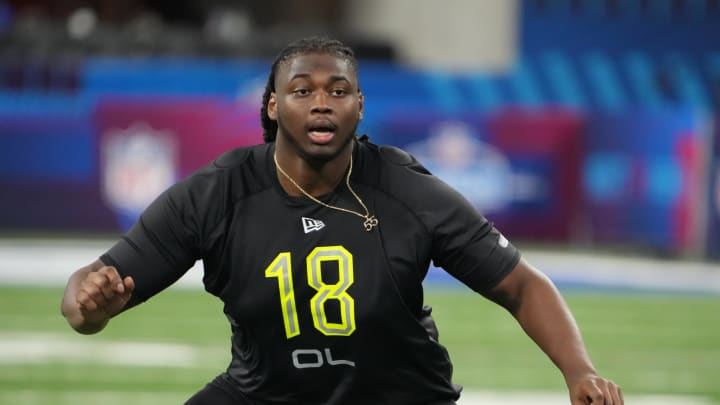 Mar 4, 2022; Indianapolis, IN, USA; Texas A&M offensive lineman Kenyon Green (OL18) goes through drills during the 2022 NFL Scouting Combine at Lucas Oil Stadium. Mandatory Credit: Kirby Lee-USA TODAY Sports