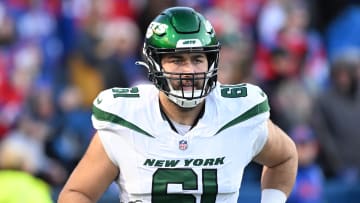 Nov 19, 2023; Orchard Park, New York, USA; New York Jets offensive tackle Max Mitchell (61) enters the field before a game against the Buffalo Bills at Highmark Stadium.