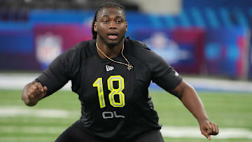 Mar 4, 2022; Indianapolis, IN, USA; Texas A&M offensive lineman Kenyon Green (OL18) goes through drills during the 2022 NFL Scouting Combine at Lucas Oil Stadium. Mandatory Credit: Kirby Lee-Imagn Images