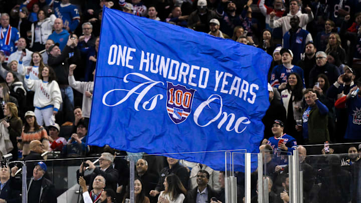Nov 16, 2025; New York, New York, USA; General view of a flag being waved by New York Rangers staff during the second period against the Detroit Red Wings at Madison Square Garden. 