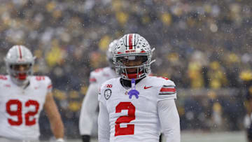 Nov 29, 2025; Ann Arbor, Michigan, USA; Ohio State Buckeyes defensive back Caleb Downs (2) reacts in the second half against the Michigan Wolverines  at Michigan Stadium. Mandatory Credit: Rick Osentoski-Imagn Images