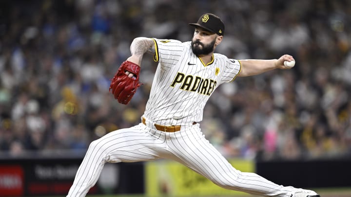 Aug 13, 2024; San Diego, California, USA; San Diego Padres relief pitcher Tanner Scott (66) pitches against the Pittsburgh Pirates during the eighth inning at Petco Park.