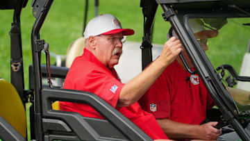 Jul 22, 2025; St. Joseph, MO, USA; Kansas City Chiefs head coach Andy Reid rides a cart down the hill to the fields prior to training camp at Missouri Western State University. Mandatory Credit: Denny Medley-Imagn Images