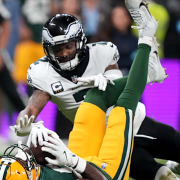 Sep 6, 2024; Sao Paulo, BRA; Green Bay Packers wide receiver Romeo Doubs (87) makes a catch against Philadelphia Eagles cornerback Darius Slay Jr. (2) during the first quarter at Neo Quimica Arena. Mandatory Credit: Kirby Lee-Imagn Images