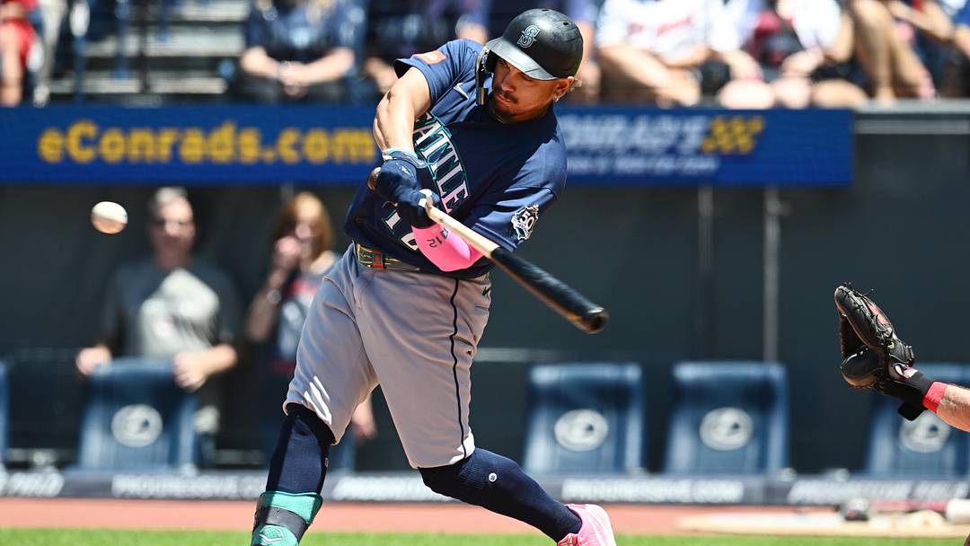 Jun 28, 2026: Seattle Mariners first baseman Josh Naylor (12) hits an RBI double during the third inning against the Cleveland Guardians at Progressive Field. 