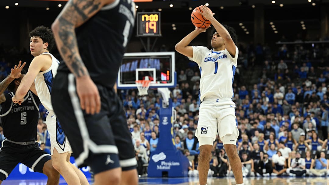 Jan 13, 2026; Omaha, Nebraska, USA;  Creighton Bluejays guard Austin Swartz (1) makes a three point basket against the Georgetown Hoyas during the second half at CHI Health Center Omaha. Mandatory Credit: Steven Branscombe-Imagn Images