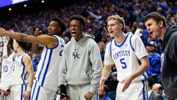 Feb 11, 2025; Lexington, Kentucky, USA; Kentucky Wildcats center Amari Williams (22), guard Jaxson Robinson (2), guard Collin Chandler (5) and guard Kerr Kriisa (77) celebrate from the bench during the first half against the Tennessee Volunteers at Rupp Arena at Central Bank Center. Mandatory Credit: Jordan Prather-Imagn Images