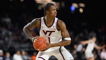 Nov 15, 2024; Baltimore, Maryland, USA; Virginia Tech Hokies forward Toibu Lawal (1) grabs a rebound during the second half against the Penn State Nittany Lions at CFG Bank Arena.