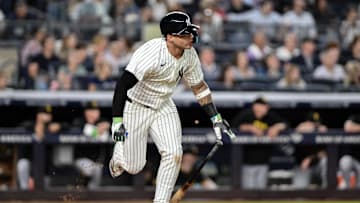Sep 27, 2024; Bronx, New York, USA; New York Yankees second baseman Gleyber Torres (25) hits a single against the Pittsburgh Pirates during the third inning at Yankee Stadium. Mandatory Credit: John Jones-Imagn Images