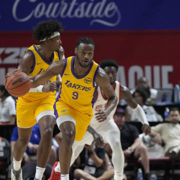 Jul 12, 2024; Las Vegas, NV, USA; Los Angeles Lakers guard Bronny James (9) dribbles the ball during the second half against the Houston Rockets at the Thomas & Mack Center. Mandatory Credit: Lucas Peltier-USA TODAY Sports