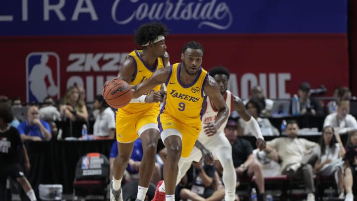 Jul 12, 2024; Las Vegas, NV, USA; Los Angeles Lakers guard Bronny James (9) dribbles the ball during the second half against the Houston Rockets at the Thomas & Mack Center. Mandatory Credit: Lucas Peltier-USA TODAY Sports