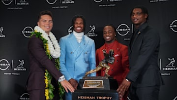 Dec 14, 2024; New York, NY, USA; From left, Heisman Trophy nominees Oregon Ducks quarterback Dillon Gabriel, Colorado Buffaloes wide receiver/cornerback Travis Hunter, Boise State Broncos running back Ashton Jeanty and Miami Hurricanes quarterback Cam Ward pose for a photo during a press conference before the 2024 Heisman Trophy Presentation. Mandatory Credit: Lucas Boland-Imagn Images