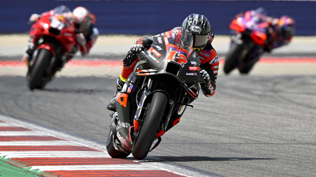 Apr 14, 2024; Austin, TX, USA; Maverick Vinales (12) of Spain and Aprilia Racing leads Pedro Acosta (31) of Spain and Red Bull Tech3 GASGAS and Enea Bastianini (23) of Italy and Ducati Lenovo Team during the MotoGP Grand Prix of The Americas at Circuit of The Americas. Mandatory Credit: Jerome Miron-Imagn Images