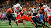 Sep 26, 2025; Corvallis, Oregon, USA; Houston Cougars running back Dean Connors (44) runs the ball and is tackled by Oregon State Beavers defensive back Jalil Tucker (2) during the second quarter at Reser Stadium. Mandatory Credit: Craig Strobeck-Imagn Images
