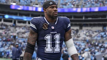 Dec 15, 2024; Charlotte, North Carolina, USA; Dallas Cowboys linebacker Micah Parsons (11) walks onto the field during the first quarter against the Carolina Panthers at Bank of America Stadium. Mandatory Credit: Jim Dedmon-Imagn Images