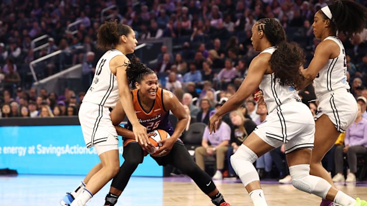 Jul 14, 2025; San Francisco, California, USA; Phoenix Mercury forward Alyssa Thomas (25) controls the ball against Golden State Valkyries forward Janelle Salaun (13) during the first quarter at Chase Center. Mandatory Credit: Kelley L Cox-Imagn Images Jul 14, 2025; San Francisco, California, USA; Phoenix Mercury forward Alyssa Thomas (25) controls the ball against Golden State Valkyries forward Janelle Salaun (13) during the first quarter at Chase Center. Mandatory Credit: Kelley L Cox-Imagn Images
