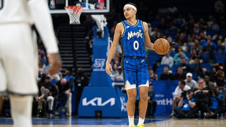 Mar 13, 2024; Orlando Magic guard Anthony Black (0) dribbles the ball against the Brooklyn Nets in the fourth quarter at Kia Center. 