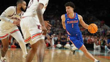 Apr 5, 2025; San Antonio, TX, USA; Florida Gators guard Walter Clayton Jr. (1) dribbles the ball against the Auburn Tigers during the second half in the semifinals of the men's Final Four of the 2025 NCAA Tournament at the Alamodome. Bob Donnan-Imagn Images