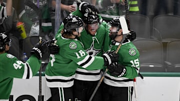 Apr 12, 2025; Dallas, Texas, USA; Dallas Stars center Colin Blackwell (15) and defenseman Brendan Smith (2) and center Sam Steel (18) celebrates a short-handed goal scored by Smith against the Utah Hockey Club during the second period at the American Airlines Center. Mandatory Credit: Jerome Miron-Imagn Images