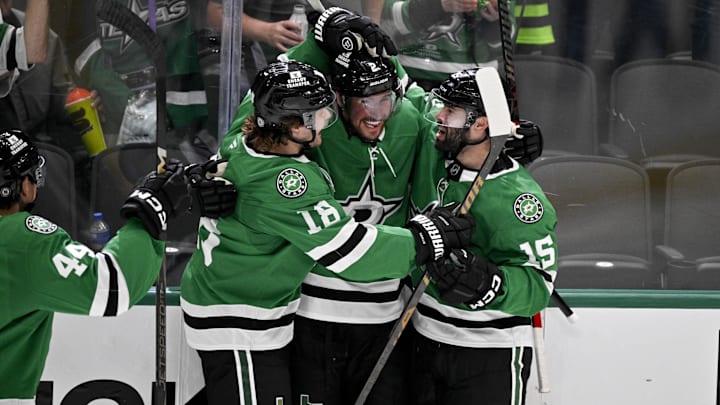 Apr 12, 2025; Dallas, Texas, USA; Dallas Stars center Colin Blackwell (15) and defenseman Brendan Smith (2) and center Sam Steel (18) celebrates a short-handed goal scored by Smith against the Utah Hockey Club during the second period at the American Airlines Center. Mandatory Credit: Jerome Miron-Imagn Images