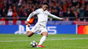 Real Madrid's Jude Bellingham takes a penalty kick.