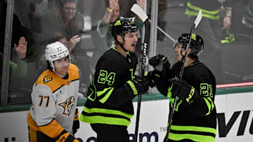 Apr 3, 2025; Dallas, Texas, USA; Dallas Stars center Roope Hintz (24) and left wing Jason Robertson (21) celebrates a goal scored by Hintz against the Nashville Predators during the third period at the American Airlines Center. Mandatory Credit: Jerome Miron-Imagn Images