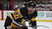 Apr 13, 2025; Pittsburgh, Pennsylvania, USA;  Pittsburgh Penguins center Sidney Crosby (87) looks on before a face-off against the Boston Bruins during the third period at PPG Paints Arena. Mandatory Credit: Charles LeClaire-Imagn Images