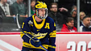 Apr 11, 2024; Saint Paul, Minnesota, USA; Michigan Wolverines forward Gavin Brindley (4) looks on in the semifinals of the 2024 Frozen Four college ice hockey tournament against the Boston College Eagles at Xcel Energy Center. Mandatory Credit: Brace Hemmelgarn-Imagn Images