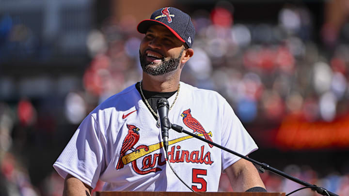 Oct 2, 2022; St. Louis, Missouri, USA;  St. Louis Cardinals first baseman Albert Pujols (5) addresses the crowd during a farewell ceremony for Pujols and catcher Yadier Molina (4) before a game against the Pittsburgh Pirates at Busch Stadium. Mandatory Credit: Jeff Curry-Imagn Images