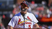 Oct 2, 2022; St. Louis, Missouri, USA;  St. Louis Cardinals first baseman Albert Pujols (5) addresses the crowd during a farewell ceremony for Pujols and catcher Yadier Molina (4) before a game against the Pittsburgh Pirates at Busch Stadium. Mandatory Credit: Jeff Curry-Imagn Images