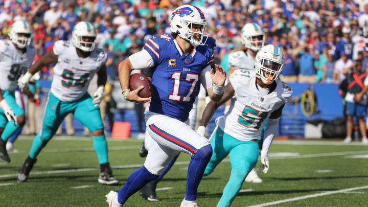 Buffalo Bills quarterback Josh Allen tucks the ball and scores a touchdown against the Miami Dolphins last season.