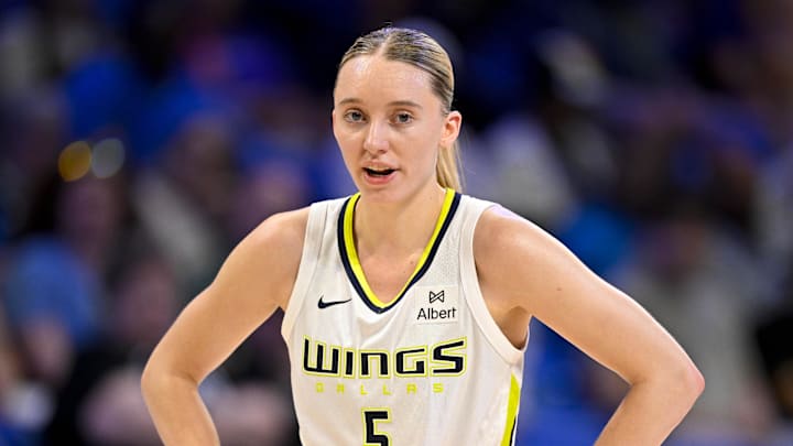 Dallas Wings guard Paige Bueckers stands on the court.