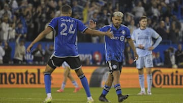 Oct 22, 2024; Montreal, Quebec, CAN; CF Montreal forward Josef Martinez (17) celebrates a goal with defender George Campbell (24) in the second half against the Atlanta United in the second half at Stade Saputo. Mandatory Credit: Eric Bolte-Imagn Images