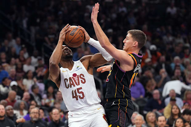 Collin Gillespie (12) guards Cleveland Cavaliers guard Donovan Mitchell