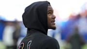 Oct 12, 2025; Indianapolis, Indiana, USA; Indianapolis Colts wide receiver Adonai Mitchell (10) watches warm ups before a game against the Arizona Cardinals  at Lucas Oil Stadium.