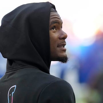 Oct 12, 2025; Indianapolis, Indiana, USA; Indianapolis Colts wide receiver Adonai Mitchell (10) watches warm ups before a game against the Arizona Cardinals  at Lucas Oil Stadium. Mandatory Credit: Christine Tannous-USA TODAY Network via Imagn Images