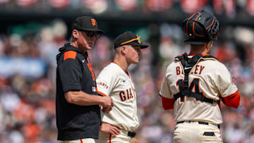 Apr 6, 2025; San Francisco, California, USA; San Francisco Giants manager Bob Melvin (6) talks with San Francisco Giants catcher Patrick Bailey (14) while waiting for the relief pitcher during the fourth inning against the Seattle Mariners at Oracle Park. Mandatory Credit: Neville E. Guard-Imagn Images