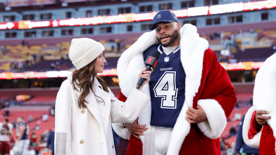 Dak Prescott wears a Santa coat after winning on Christmas.