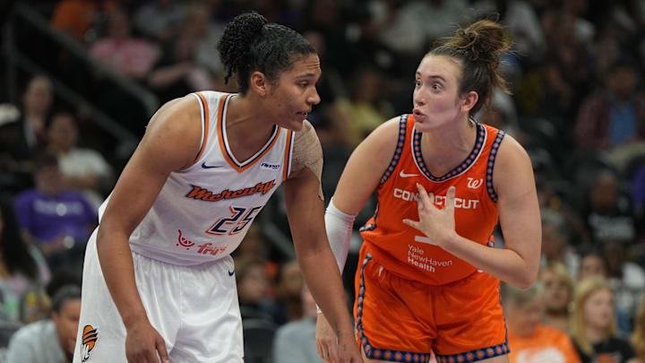 Aug 5, 2025; Phoenix, Arizona, USA; Phoenix Mercury forward Alyssa Thomas (25) and Connecticut Sun guard Marina Mabrey (3) talk in the second half at Footprint Center. Aug 5, 2025; Phoenix, Arizona, USA; Phoenix Mercury forward Alyssa Thomas (25) and Connecticut Sun guard Marina Mabrey (3) talk in the second half at Footprint Center.
