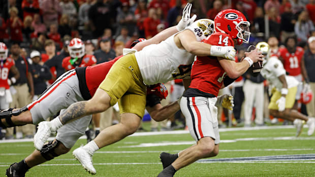 Notre Dame defensive lineman Donovan Hinish records a sack to end the Sugar Bowl victory over Georgi