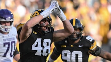 Oct 26, 2024; Iowa City, Iowa, USA; Iowa Hawkeyes defensive lineman Max Llewellyn (48) reacts after a safety against the Northwestern Wildcats during the second quarter at Kinnick Stadium. Mandatory Credit: Jeffrey Becker-Imagn Images