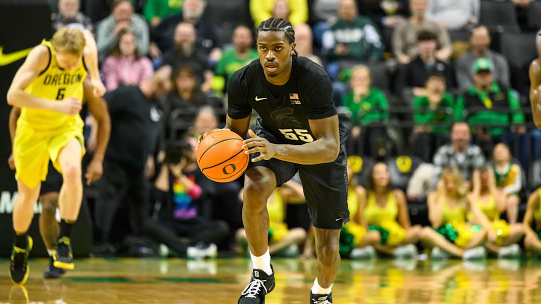Jan 20, 2026; Eugene, Oregon, USA; Michigan State Spartans forward Coen Carr (55) brings the ball up court during the second half against the Oregon Ducks at Matthew Knight Arena. Mandatory Credit: Craig Strobeck-Imagn Images Jan 20, 2026; Eugene, Oregon, USA; Michigan State Spartans forward Coen Carr (55) brings the ball up court during the second half against the Oregon Ducks at Matthew Knight Arena. Mandatory Credit: Craig Strobeck-Imagn Images