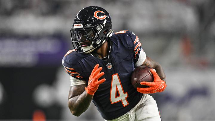 Dec 16, 2024; Minneapolis, Minnesota, USA; Chicago Bears running back D'Andre Swift (4) runs the ball against the Minnesota Vikings during the third quarter at U.S. Bank Stadium. Mandatory Credit: Jeffrey Becker-Imagn Images