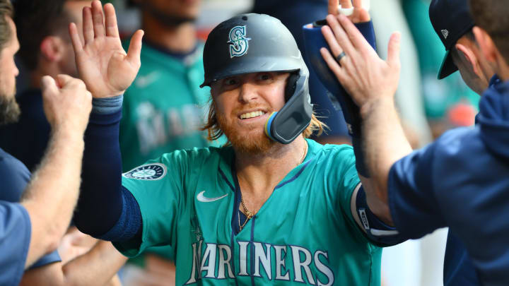 Seattle Mariners first baseman Justin Turner celebrates after scoring a run against the New York Mets on Saturday at T-Mobile Park.