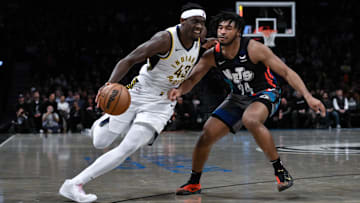 Apr 3, 2024; Brooklyn, New York, USA; Indiana Pacers forward Pascal Siakam (43) drives to the basket while being defended by Brooklyn Nets guard Cam Thomas (24) during the second quarter at Barclays Center. Mandatory Credit: John Jones-Imagn Images