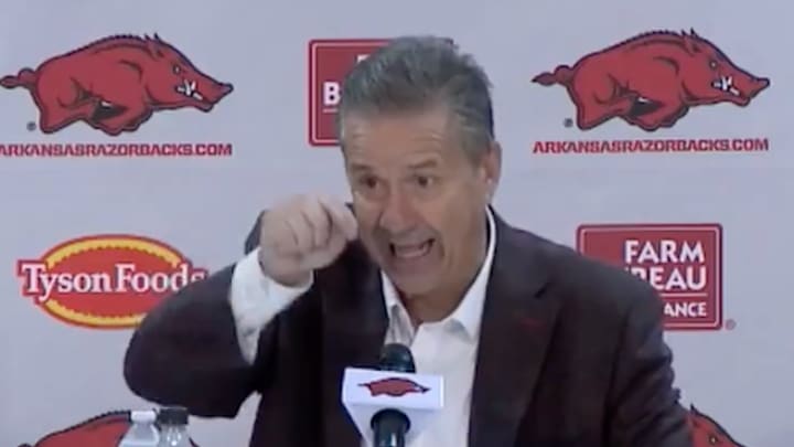Arkansas coach John Calipari imitates a basketball rattling around the rim during his press conference following the Razorbacks' 76-60 win over Lipscomb on November 6, 2024. 