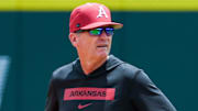 Arkansas Razorback coach Dave Van Horn worked with his infielders during practice before the Super Regional against the Tennessee Volunteers at Baum-Walker Stadium last week in Fayetteville.